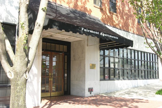 Fairmont front entrance into apartment building, double door and overhead shade